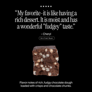 Cross-section of a David Fudge Brownie flavored protein bar with a positive customer review and flavor description