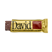David Fudge Brownie flavored protein bar packaging on a black background