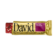 David Red Velvet flavored protein bar packaging on a black background