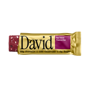 David Red Velvet flavored protein bar packaging on a black background