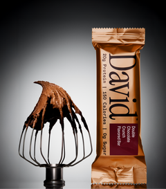 David Bronze Double Chocolate protein bar with chocolate-covered whisk