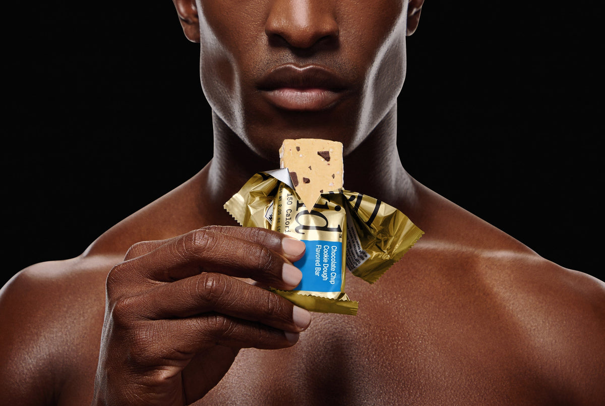 Man holding a David Chocolate Chip Cookie Dough bar