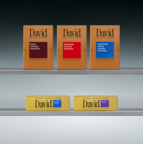 Five different David protein bar boxes on a shelf