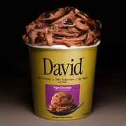 Gold container of David Triple Chocolate frozen dessert on a dark background