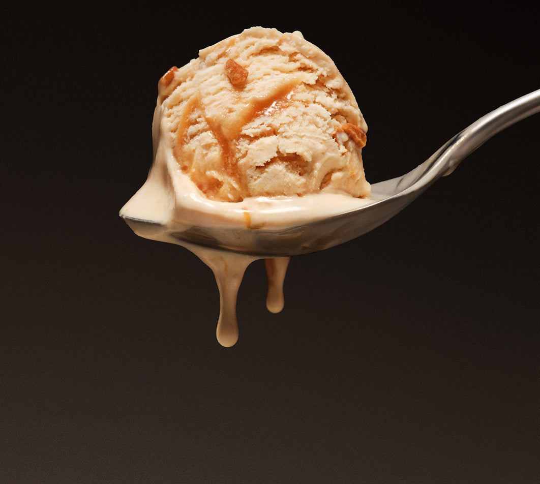 Scoop of melting David Triple Peanut Butter on a silver spoon